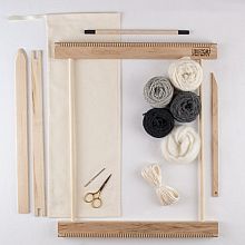 A Weaving Frame & Weaving Kit (14 Inch - Gray).  Everything you need to make your own woven wall hanging.